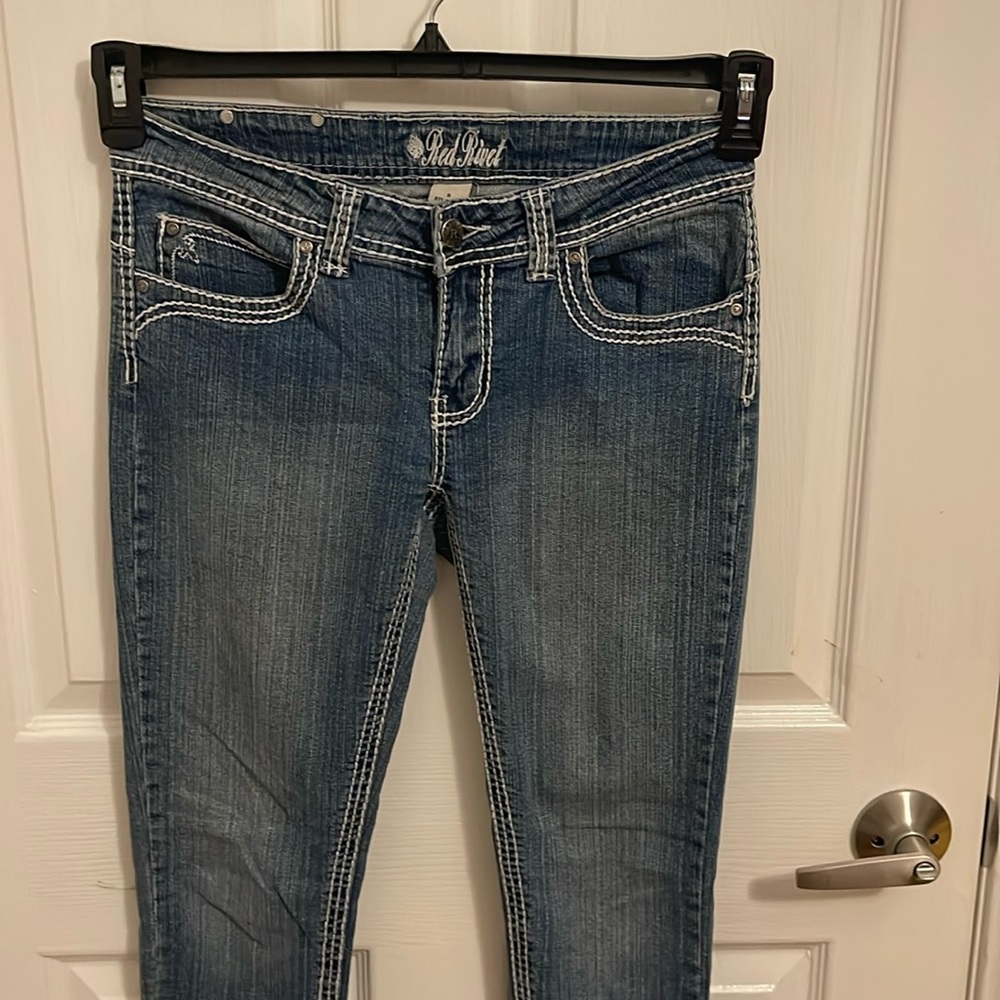 Women’s red rivet jeans